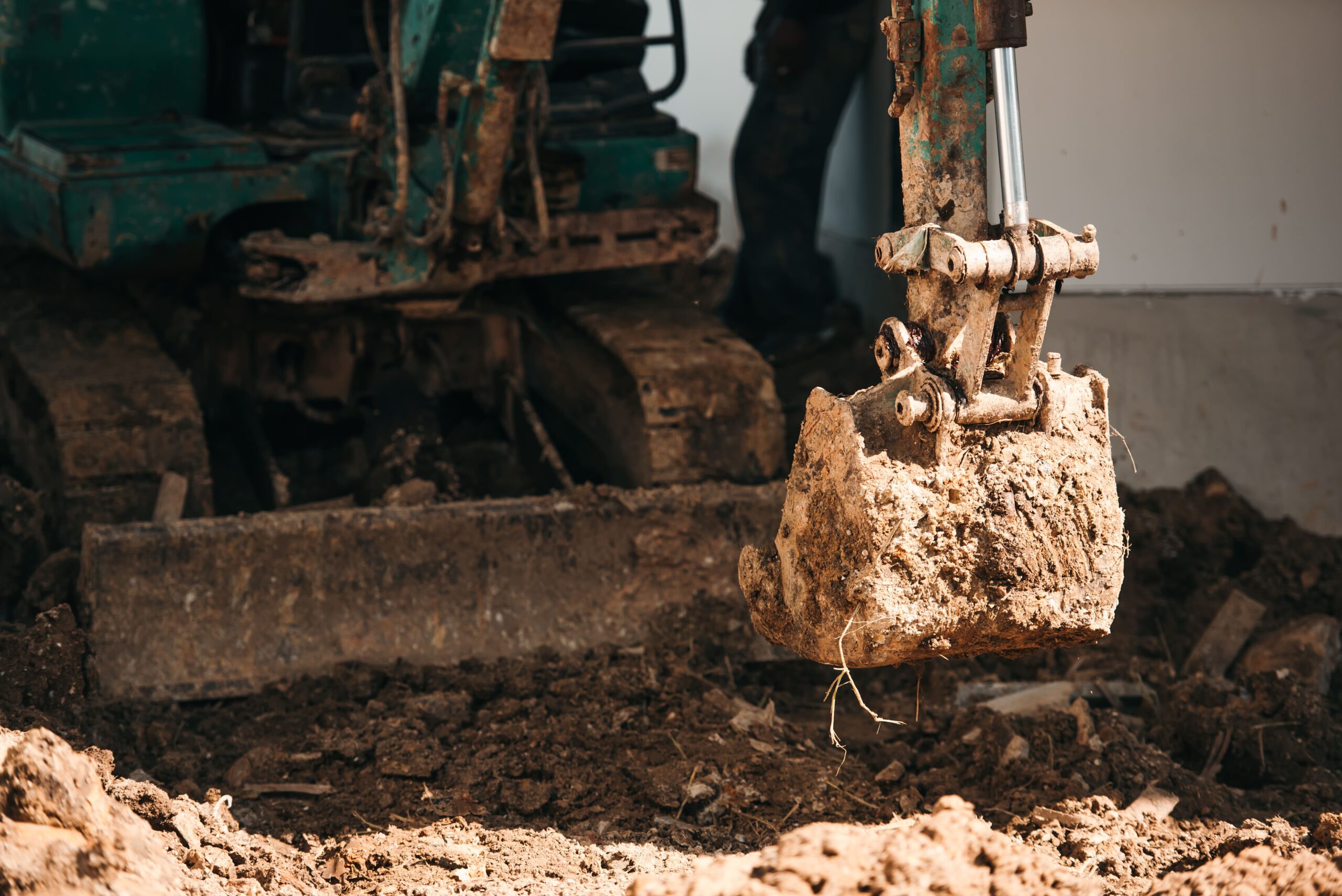 close-up-worker-backhoe-working-construction-site (1)